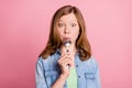 Photo portrait girl staring hungry licking spoon isolated pastel pink color background