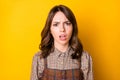 Photo portrait of girl unhappy unsatisfied wearing checkered outfit isolated on vibrant yellow color background