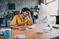 Photo portrait of handsome young guy wear yellow shirt busy overloaded stressed workplace stylish room interior home