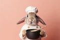 Photo portrait of happy cute hare dressed as chef , concept of Animal costume, created with Generative AI technology