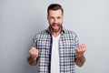 Photo portrait of impressed businessman gesturing like winner cheerful isolated on grey color background