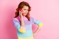 Photo portrait of indifferent girl having boring phone conversation isolated on pastel pink colored background with Royalty Free Stock Photo