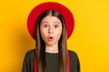 Photo portrait of little girl staring amazed in casual clothes isolated on bright yellow color background Royalty Free Stock Photo