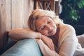 Photo portrait of lovely retired woman sit sofa sleeping relax dressed casual outfit cozy home interior living room in Royalty Free Stock Photo