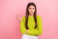 Photo portrait of lovely teen lady sad depressed argue bad mood stressed dressed stylish green clothes isolated on pink Royalty Free Stock Photo