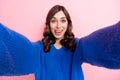 Photo portrait of lovely young lady lick teeth selfie photo excited dressed stylish blue garment isolated on pink color