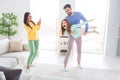 Photo portrait of mom taking photo of daughter playing with father flying like plane happy overjoyed at home