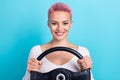 Photo portrait of optimistic cheerful girl drive her expensive car hold steering wheel comfortable speed control