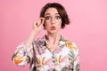 Photo portrait pretty girl whistling surprised wearing printed shirt glasses isolated pastel pink color background