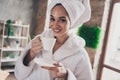 Photo portrait of pretty young girl drinking delicious tea relax head wrapped towel dressed bath robe beauty routine Royalty Free Stock Photo