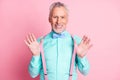 Photo portrait of smiling metrosexual with white beard keeping suspenders wearing shirt bowtie isolated on pink color Royalty Free Stock Photo