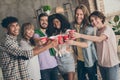 Photo portrait of students overjoyed happy drinking beer telling toast cheers at party