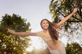 Photo portrait woman spending free time in summer park smiling happy with opened hands missing friends hugging