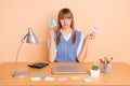 Photo portrait of woman with stickers grumpy moody face working in office isolated on pastel beige color background