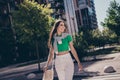 Photo portrait of young brunette lady going wear luxurious casual outfit bring handbag accessory looking a side outside Royalty Free Stock Photo