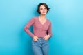 Photo portrait young charming lady wear pink shirt jeans pants stand pose camera consumerism isolated blue color Royalty Free Stock Photo