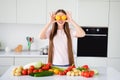 Photo portrait young woman closed eyes with paprika preparing dinner Royalty Free Stock Photo