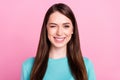 Photo of positive charming young pretty woman blink eye good mood isolated on pastel pink color background Royalty Free Stock Photo