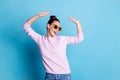 Photo of positive cheerful excited girl enjoy rejoice dance raise hands have party discotheque wear pullover isolated Royalty Free Stock Photo