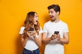 Photo of positive excited people man and woman screaming and loo Royalty Free Stock Photo