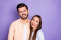 Photo of positive guy lady tongue out lick lip squint eyes have good mood isolated on violet color background Royalty Free Stock Photo