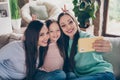 Photo of positive nice funky family sit couch phone selfie portrait make v-sign wear casual clothes home indoors