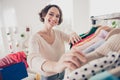 Photo of positive pretty cute woman wardrobe organize good mood outfit choose indoors inside house living room home Royalty Free Stock Photo