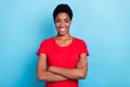 Photo of positive pretty short hair human wear red t-shirt arms crossed isolated blue color background