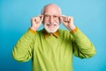 Photo of positive retired grandfather hands hold eyewear wear specs green sweater isolated blue color background