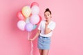 Photo of pretty adorable lady bun hairdo hold many air balloons birthday celebration sending air kisses thankful for Royalty Free Stock Photo