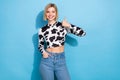 Photo of pretty confident lady wear dalmatian print clothes showing thumb up isolated blue color background