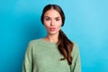 Photo of pretty coquettish lady pouted lips kiss wear pullover isolated on blue color background
