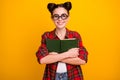 Photo of pretty crazy lady two buns hold book close to chest love story favorite historic novel wear geek vision specs Royalty Free Stock Photo