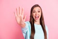 Photo of pretty funky young woman raise hand give high five you excited isolated on pastel pink color background