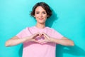 Photo of pretty gentle positive lady girlfriend stylish pink outfit arm present demonstrate heart figure isolated on