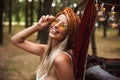 Photo of pretty hippy woman, wearing stylish accessories smiling Royalty Free Stock Photo