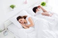 Photo of pretty lady handsome guy married couple lying sheets bed covered white blanket enjoy weekend saturday morning