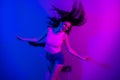 Photo of pretty positive girl have fun enjoy disco partying toothy smile flying hair isolated on gradient background Royalty Free Stock Photo