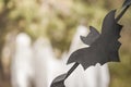 A photo project for Halloween in nature. A garland of black drawn bats against the backdrop of three white ghosts in a forest of g Royalty Free Stock Photo