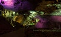 Photo Prometheus cave with beautifully illuminated stalactites and stalagmites