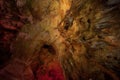 Photo Prometheus cave with beautifully illuminated stalactites and stalagmites