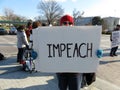 Protester Holding Impeach Sign