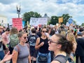 Many Supreme Court Protesters Bearing Signs in Washington DC