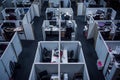 This photo provides an overhead view of a workspace filled with cubicles and desks, Aerial view of an office cubicle, AI Generated