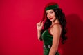 Photo of provocative gorgeous mistress tempting look camera wear elf hat costume isolated red color background