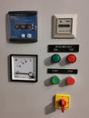 Photo of push buttons, elr, meters, selector switch and pilot lamps.