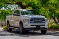 Photo of a ram pick up truck under shade