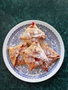 Recipe square baked pies envelopes from flaky puff pastry stuffed with apples, cherries Royalty Free Stock Photo