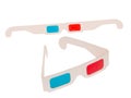 Photo of red and cyan cardboard 3D glasses isolated on white. Two pairs. Folded and flat.