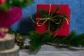 Photo of a red gift box in the background in focus.